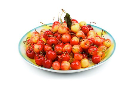 simsearch:400-08020671,k - Delicious Yellow and Red Sweet Cherries on Big Plate isolated on white background Stock Photo - Budget Royalty-Free & Subscription, Code: 400-06916279