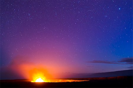 Kilauea Volcano glows under a starry night sky at Hawaii Volcanoes National Park on the Big Island of Hawaii. Stock Photo - Budget Royalty-Free & Subscription, Code: 400-06916282