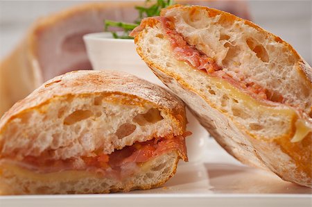 simsearch:400-06641159,k - Italian ciabatta panini sandwich with parma ham and tomato Foto de stock - Super Valor sin royalties y Suscripción, Código: 400-06916532