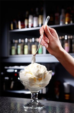 eating sundae - a glass of ice-cream stands on the bar Stock Photo - Budget Royalty-Free & Subscription, Code: 400-06916762