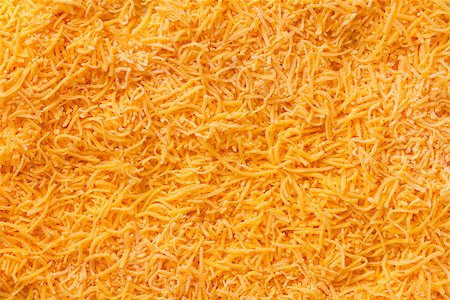 Grated cheese as background yellow. Nutrition. Food. Photographie de stock - Aubaine LD & Abonnement, Code: 400-06916851