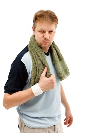 Tired sportsman with green towel on his neck Stock Photo - Budget Royalty-Free & Subscription, Code: 400-06917090