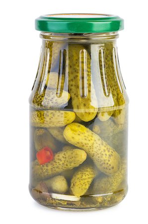 pickling gherkin - Pickles in a glass jar isolated on a white background Stock Photo - Budget Royalty-Free & Subscription, Code: 400-06917265