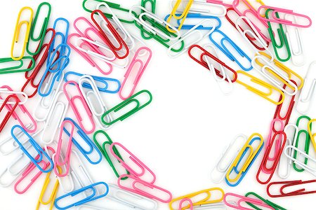 simsearch:400-06696037,k - Colored paper clips with empty space. Isolated on white Stock Photo - Budget Royalty-Free & Subscription, Code: 400-06917399