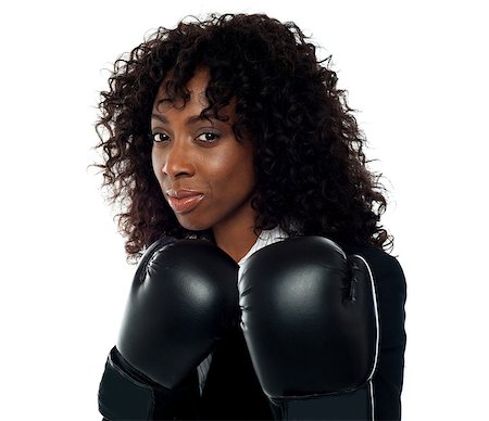 simsearch:400-05718453,k - Beautiful female executive wearing boxing gloves. Get ready for some action Stock Photo - Budget Royalty-Free & Subscription, Code: 400-06917632