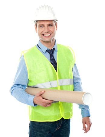 Young architect wearing protective helmet holding construction map Stock Photo - Budget Royalty-Free & Subscription, Code: 400-06917653