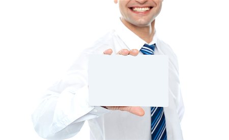 employee hold a sign - Cropped image of man showing business card isolated over white background Stock Photo - Budget Royalty-Free & Subscription, Code: 400-06917712