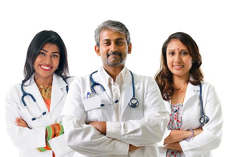 Indian doctors. Group of Indian medical doctors, male and female standing isolated on white background. Stock Photo - Budget Royalty-Free & Subscription, Code: 400-06918075