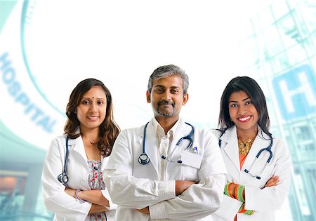 Indian doctors. Group of Indian medical doctors, male and female standing inside hospital. Stock Photo - Budget Royalty-Free & Subscription, Code: 400-06918076