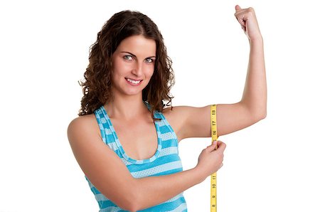 pic of girls with biceps - Surprised woman measuring her Biceps, isolated in a white background Stock Photo - Budget Royalty-Free & Subscription, Code: 400-06918261