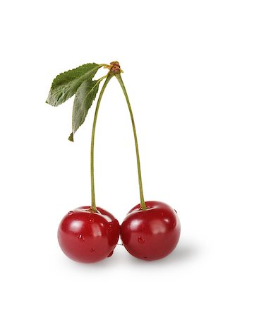 simsearch:400-06921455,k - ripe cherries with stem and leaves, isolated on white Foto de stock - Super Valor sin royalties y Suscripción, Código: 400-06918341