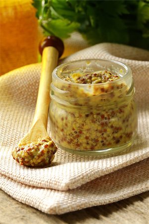 dijon - Traditional dijon mustard in a glass jar Photographie de stock - Aubaine LD & Abonnement, Code: 400-06918840