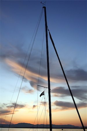 simsearch:400-05358643,k - Sailboat mast at sunset Foto de stock - Super Valor sin royalties y Suscripción, Código: 400-06919014