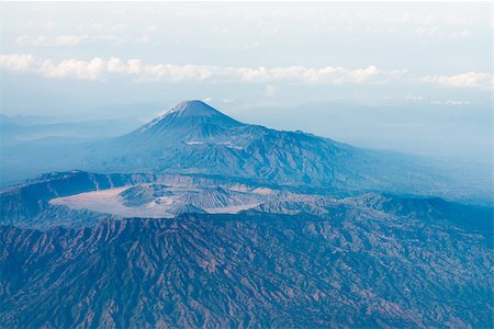 simsearch:400-04135827,k - Big volcano crater with other volcano top on background, bird's eye view. Java island, Indonesia Foto de stock - Royalty-Free Super Valor e Assinatura, Número: 400-06919674