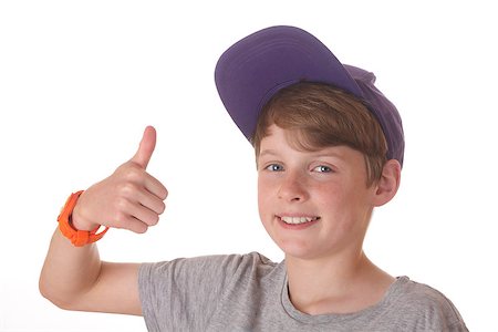 simsearch:400-06065852,k - Portrait of a teenage boy with cap and thumbs up Stock Photo - Budget Royalty-Free & Subscription, Code: 400-06919727