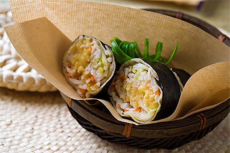 peranakan - Closeup of a Malaysia popiah fresh spring roll  filling with turnip, Jicama, bean sprouts, grated carrots, tofu and chopped peanuts. Popiah fresh spring roll . Photographie de stock - Aubaine LD & Abonnement, Code: 400-06919883