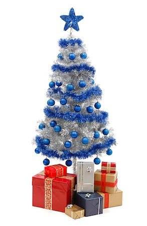 simsearch:400-06421347,k - Artificial silver christmas tree isolated on white, decorated with blue ornaments and silver garland, a lot of presents under the tree Stockbilder - Microstock & Abonnement, Bildnummer: 400-06912587