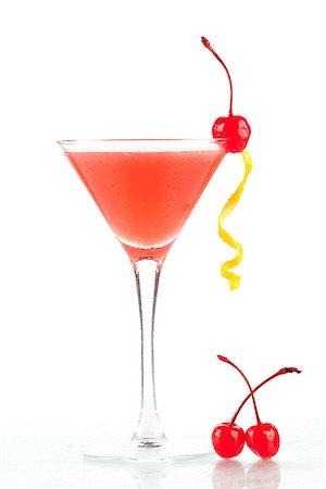 simsearch:400-06913325,k - Alcohol cocktail with orange juice and grenadine with two cherry isolated on white background Stockbilder - Microstock & Abonnement, Bildnummer: 400-06913345