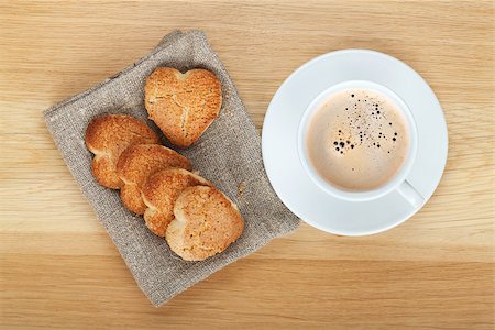 simsearch:400-07090594,k - Coffee cup and cookies on wooden table. View from above Foto de stock - Super Valor sin royalties y Suscripción, Código: 400-06913464