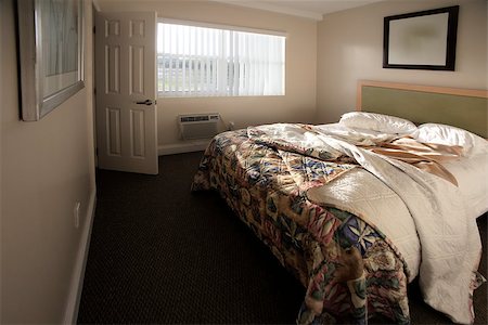 stay - Double bed in the hotel room Stock Photo - Budget Royalty-Free & Subscription, Code: 400-06913666