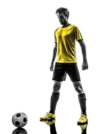 simsearch:400-07103133,k - one brazilian soccer football player young man in silhouette studio  on white background Stock Photo - Budget Royalty-Free & Subscription, Code: 400-06913714
