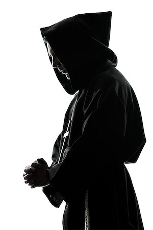simsearch:614-02764159,k - one caucasian man priest praying silhouette in studio isolated on white background Stockbilder - Microstock & Abonnement, Bildnummer: 400-06913744