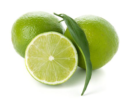 simsearch:400-05128284,k - Two and half ripe limes. Isolated on white Foto de stock - Super Valor sin royalties y Suscripción, Código: 400-06913954