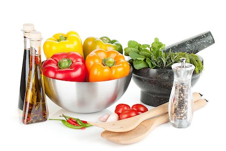 simsearch:400-07211737,k - Fresh bell peppers, herbs and condiments. Isolated on white background Photographie de stock - Aubaine LD & Abonnement, Code: 400-06913985