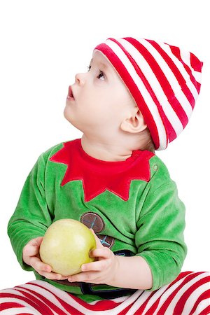 simsearch:400-07088886,k - Small baby in santa suit with apple. Closeup, isolated on white Stock Photo - Budget Royalty-Free & Subscription, Code: 400-06924438