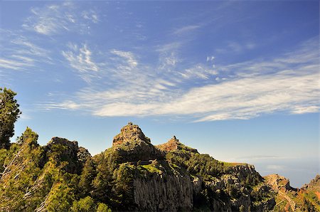 Beautiful clouds over the rocks covered in green vegetation, Spain La Gomera Foto de stock - Super Valor sin royalties y Suscripción, Código: 400-06924602