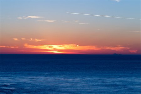 Sunset over the ocean Stock Photo - Budget Royalty-Free & Subscription, Code: 400-06925141