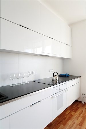 simsearch:400-04305447,k - modern kitchen interior in minimalism style Foto de stock - Super Valor sin royalties y Suscripción, Código: 400-06925195