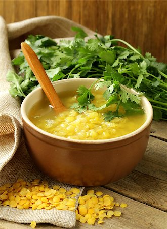 simsearch:400-08786286,k - yellow lentil soup with green coriander Fotografie stock - Microstock e Abbonamento, Codice: 400-06926135