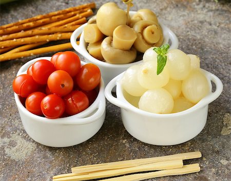 pickled snacks (tapas) - mushrooms, tomatoes, cucumbers and pearl onions Stock Photo - Budget Royalty-Free & Subscription, Code: 400-06926139