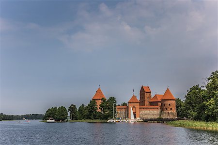 simsearch:700-03404319,k - Trakai red brick castle in lake Galve Stock Photo - Budget Royalty-Free & Subscription, Code: 400-06926146