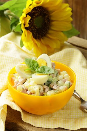 potato salad yellow - egg salad with quail eggs, cucumber and sausage Stock Photo - Budget Royalty-Free & Subscription, Code: 400-06926349