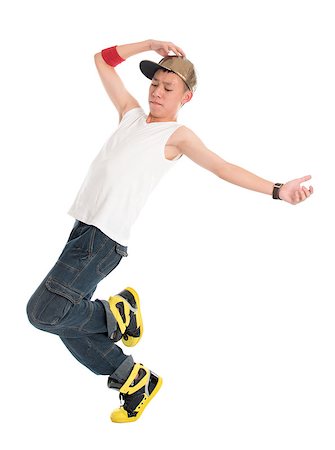 Full body funky looking Asian teen hip hop dancer dancing isolated on white background. Asian youth culture. Stock Photo - Budget Royalty-Free & Subscription, Code: 400-06926967