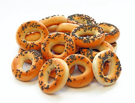 simsearch:400-08093809,k - Drying bagels with poppy seeds on a white background Foto de stock - Super Valor sin royalties y Suscripción, Código: 400-06926981