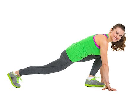 Smiling fitness young woman stretching Stock Photo - Budget Royalty-Free & Subscription, Code: 400-06927269