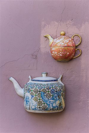 Teapots immured in a wall in Vilnius, Lithuania Stock Photo - Budget Royalty-Free & Subscription, Code: 400-06927454