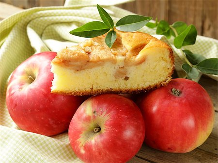 simsearch:400-06946823,k - piece of homemade apple pie with cinnamon on a wooden table Fotografie stock - Microstock e Abbonamento, Codice: 400-06927682