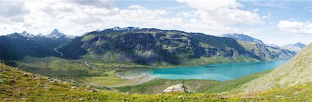 Panorama image towards Gjendebu at the Gjende lake in Jotunheimen national park in Norway. The Gjende is supposed to be one of the most beautiful lakes in Norway. Stockbilder - Microstock & Abonnement, Bildnummer: 400-06928864