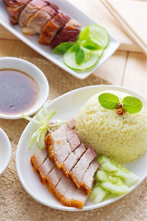 pig roast - Siu Yuk or crispy roasted belly pork Chinese style and roast duck, served with steamed rice. Singapore Chinese cuisines. Stock Photo - Budget Royalty-Free & Subscription, Code: 400-06928964