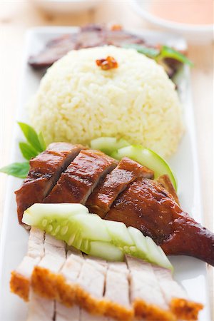 Roasted duck and roasted pork crispy siu yuk, Chinese style, served with steamed rice on dining table. Malaysia cuisine. Photographie de stock - Aubaine LD & Abonnement, Code: 400-06928970