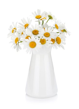 simsearch:400-07179442,k - Chamomile bouquet in vase. Isolated on white background Stock Photo - Budget Royalty-Free & Subscription, Code: 400-06920720