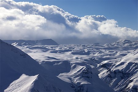 simsearch:400-07222348,k - Snow plateau in clouds. Caucasus Mountains, Georgia, view from ski resort Gudauri. Fotografie stock - Microstock e Abbonamento, Codice: 400-06920948