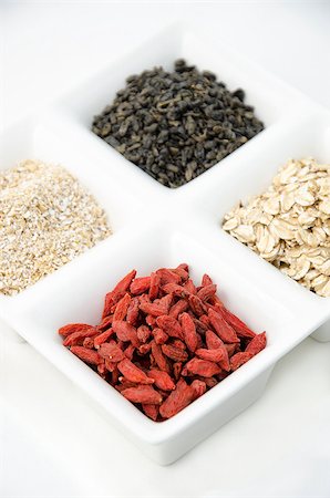 simsearch:400-07545974,k - Goji, green tea, oat bran and oat flakes - Nutrient value and antioxidant content Stock Photo - Budget Royalty-Free & Subscription, Code: 400-06921022