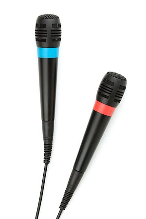 simsearch:400-04348398,k - Two cable microphones. Isolated on white background Fotografie stock - Microstock e Abbonamento, Codice: 400-06921218