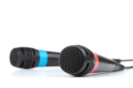 simsearch:400-04348398,k - Two cable microphones. Isolated on white background, small DOF Fotografie stock - Microstock e Abbonamento, Codice: 400-06921219