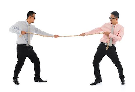 Full body two Asian businessmen pulling a rope, isolated on white background. Asian male model. Stock Photo - Budget Royalty-Free & Subscription, Code: 400-06922046